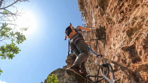 Image of a woman rock climbing tarifa spain